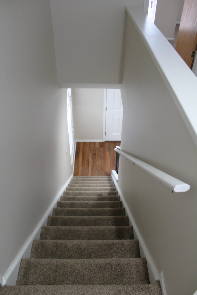 Spinnaker Club Interior looking down stairs